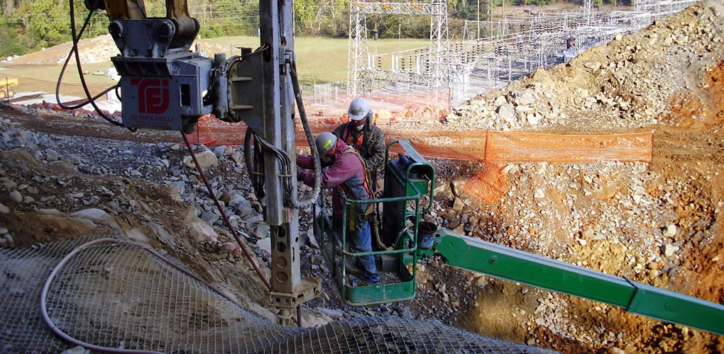 Workers on substation construction site