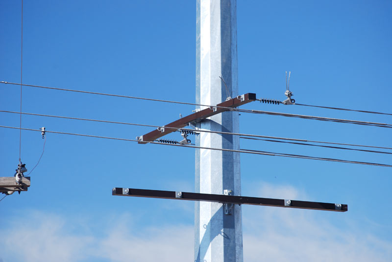 electrical crossarm in use in overhead transmission lines.