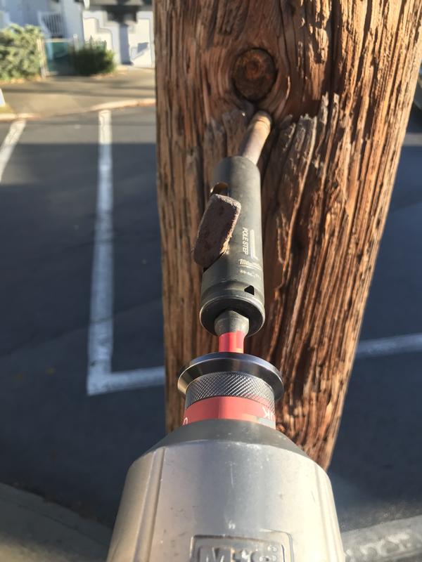 pole step being used to climb up a pole