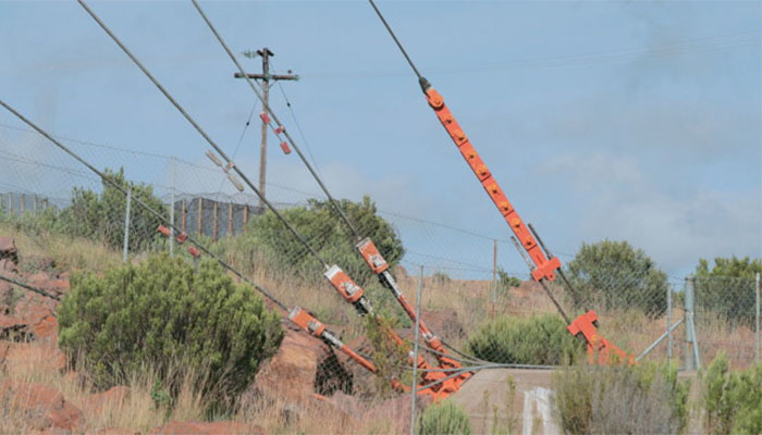 Guy wire securing tall structures